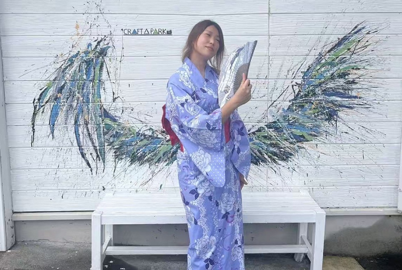 Woman in a yukata enjoying the view.